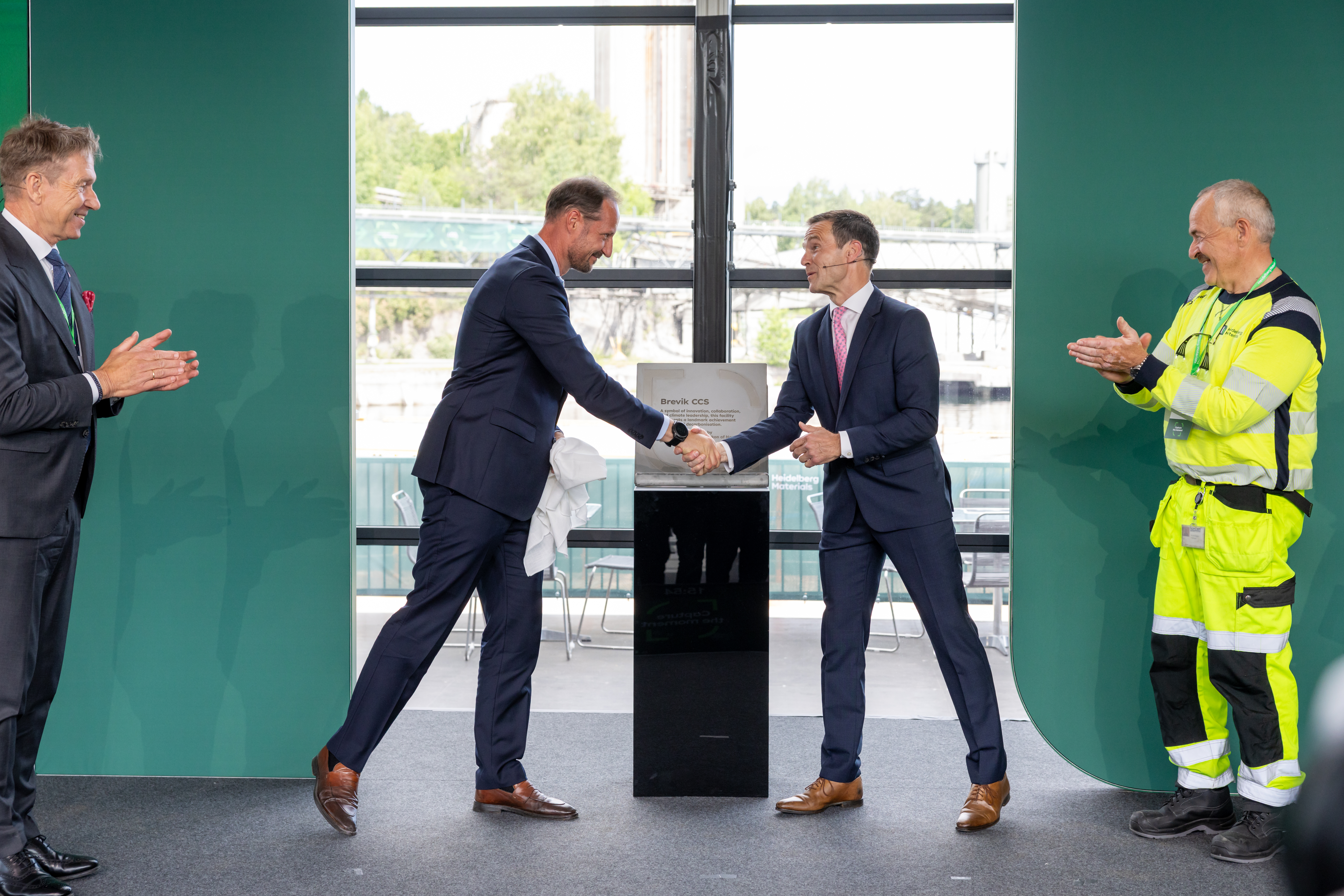 Norway's Crown Prince Haakon with Heidelberg Materials CEO Dominik von Achten